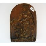 An 18th century terracotta St Matthew gingerbread mold, 30.5 x 21 x 5cm (repaired).