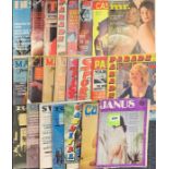 A group of vintage mixed erotic magazines.