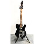 A black Thinline Telecaster style electric guitar with stand.