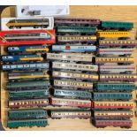 Seven 00 gauge diesel locomotives with a quantity of passenger rolling stock.