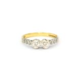 An antique 18ct gold and platinum diamond set ring, (M.5).