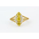 A 9ct yellow gold ring set with diamonds and brilliant cut fancy yellow diamonds, approx. 1ct