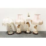 Four figural table lamps, tallest H. 61cm.