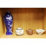 A Chinese prunus design porcelain vase, H. 32cm, together with three further Chinese ceramic items.