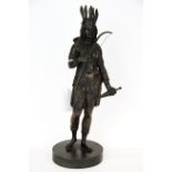 An antique bronze figure representing North America from the series Representing the Continents