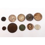 Ten mixed international coins, including a Louis XVI coin and others.