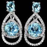 A pair of 925 silver drop earrings set with blue topaz and white stones, L. 3.5cm.