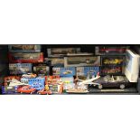 A quantity of die cast model vehicles, model ships and aeroplanes.