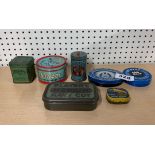 A group of seven early collector's tins.