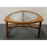 A 1970's Nathan teak and glass coffee table, 76 x 44cm.