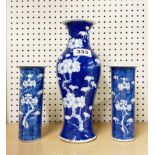 A Chinese 19th century prunus pattern porcelain garniture, tallest 75cm.