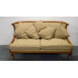 An impressive carved and gilt wood classical settee, W. 180cm.