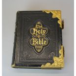 A large 19th century leather bound illustrated edition of the Holy bible, L. 33cm.