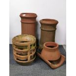 Two terracotta chimney pots, largest 62cm (A/F), together with two terracotta chimney cowls.