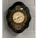 A 19th century French mother of pearl inlaid wall clock by Sergent of Amiens, H. 51cm.
