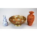 A large enamelled brass fruit bowl, together with an Yi Xing terracotta vase and a blue and white