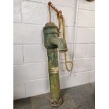 An antique cast iron water pump, H. 116cm.
