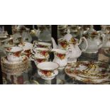 A Royal Albert Old Country Roses tea set, comprising seven cups, eight saucers, tea pot sugar
