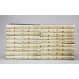 A collection of half velum and clothbound volumes of the works of George Meredith.