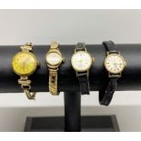 Two ladies' vintage 9ct gold wristwatches and two others.