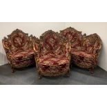 A superb hand carved and button backed three piece Palazzo salon suite, settee L. 188cm.