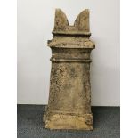 An antique terracotta chimney pot, H. 75cm.