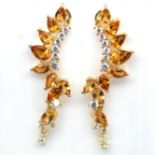 A pair of 925 silver large earrings set with pear cut citrines and white stones, L. 4cm. Condition