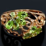 A 925 silver rose gold gilt ring set with peridots, (P). Condition NEW, includes gift pouch.