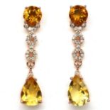 A pair of 925 silver gilt drop earrings set with pear and round cut yellow and orange citrines and