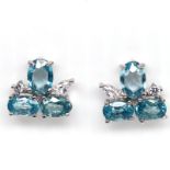 A pair of 925 silver earrings set with oval cut natural seafom zircon and white stones, L. 1.2cm.