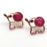 A pair of 925 silver rose gold gilt elephant shaped stud earrings set with round cut rubies and