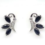 A pair of 925 silver bee shaped stud earrings set with marquise and round cut sapphires and white