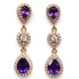 A pair of 925 silver drop earrings set with round and pear cut amethysts, L. 3.2cm. Condition NEW,