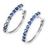 A pair of 925 silver hoop earrings set with sapphires, L. 2.2cm. Condition NEW, includes gift