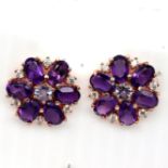 A pair of 925 silver rose gold gilt cluster earrings set with oval cut amethysts, Dia. 1.6cm.