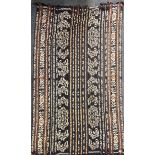 An unsual Indonesian Lombok hand woven cotton rug/throw, 140 x 230cm. Provenance: estate of a
