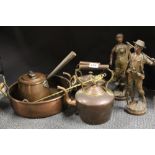A quantity of antique copper items and a pair of spelter figures.