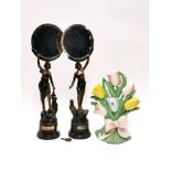 A pair of early 20th century painted spelter figural mirrors on Bakelite bases, H. 40cm, together