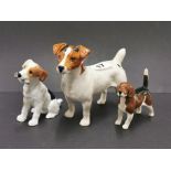 A Beswick figure of a Jack Russell Terrier, H. 13cm, together with a Royal Doulton terrier and a