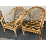 A pair of conservatory cane chair frames.