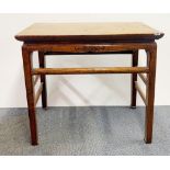 A 19th century Chinese carved elm side table, 93 x 45 x 83cm. Old indentation marks to top.