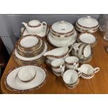 An extensive Wedgwood 'Chippendale' pattern dinner and tear set (mostly eight settings).