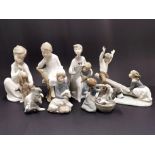 A group of seven Lladro figurines, most with boxes, tallest H. 21cm (seesaw A/F).
