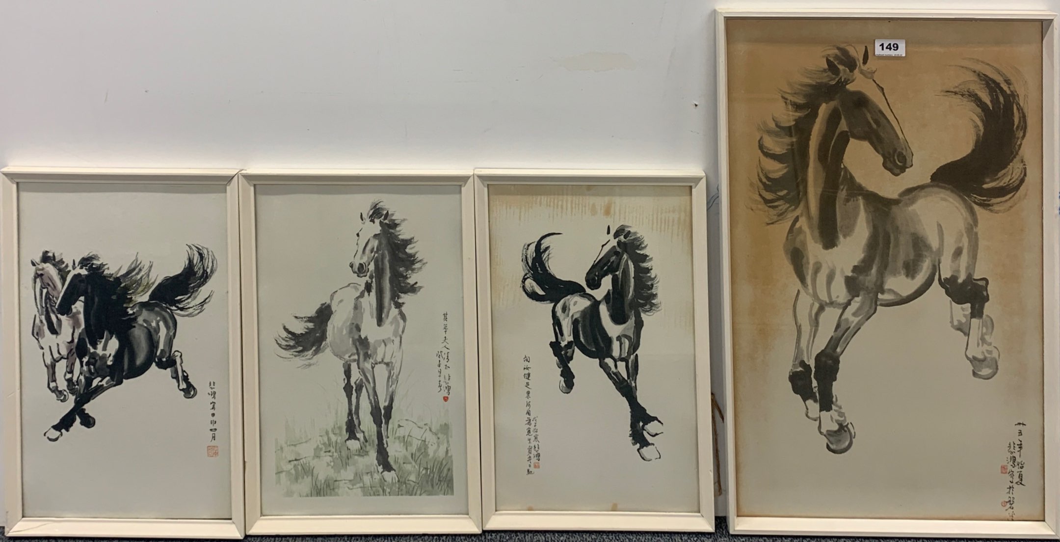 A group of four 1970's framed prints of horses, largest frame size 42 x 67cm.