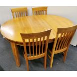 A heavy quality contemporary beechwood extending dining table and four chairs, extended size 159 x