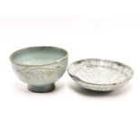 A Chinese relief decorated celadon glazed porcelain bowl, Dia. 16.5cm, H. 11cm, together with a