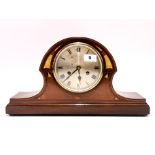 A 1920's mother of pearl inlaid striking mantle clock, 45 x 25cm. No key but appears to be in