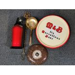 A M&B bar tray with a soda siphon, granite barometer and two brass items.