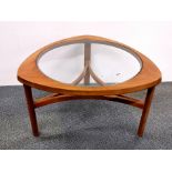 A 1970's teak and glass coffee table, 75 x 75 x 44cm.