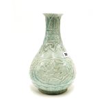 A Chinese incised celadon glazed porcelain vase, H. 29cm. Provenance: estate of a gentleman